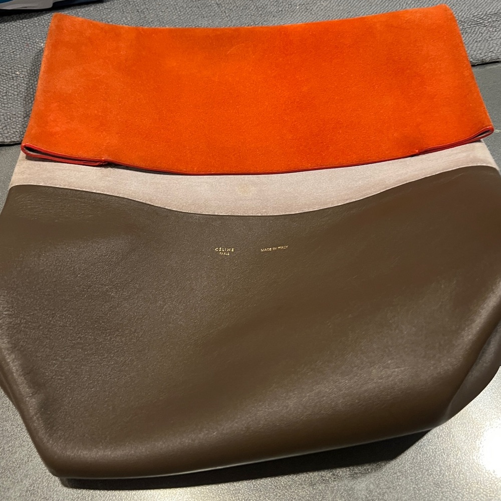 Good used condition, altered (strap removed) some wear/discolor on edges (shown)